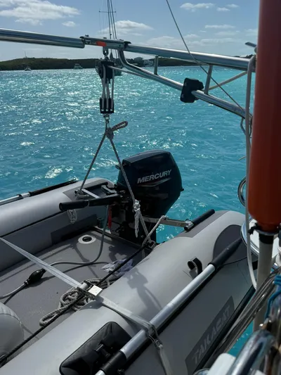  Yacht Photos Pics Catalina 470 sailboat with Mercury motor on turquoise water, 2005 model.