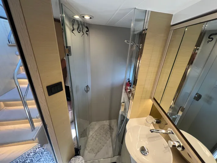Balance Yacht Photos Pics Luxurious bathroom in 2018 Princess F55 yacht with modern fixtures and glass shower.