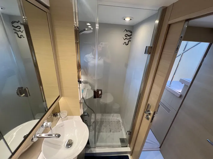 Balance Yacht Photos Pics Modern bathroom in 2018 Princess F55 yacht with glass shower and sleek fixtures.