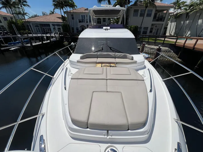 Balance Yacht Photos Pics 2018 Princess F55 yacht with sunbathing deck, docked in a marina.