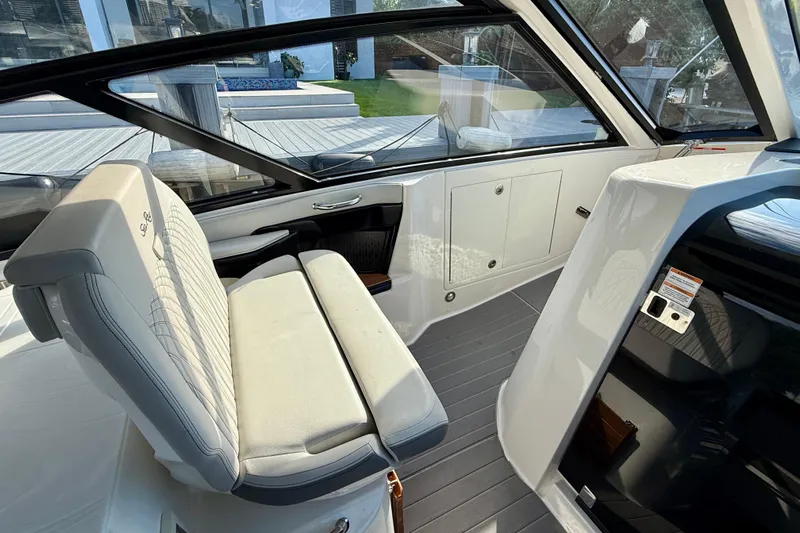  Yacht Photos Pics 2022 Sea Ray Sundancer 370 Outboard interior with sleek seating and modern design.