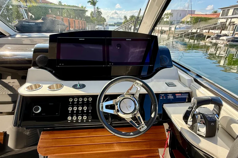  Yacht Photos Pics 2022 Sea Ray Sundancer 370 Outboard helm with modern controls and dual displays.