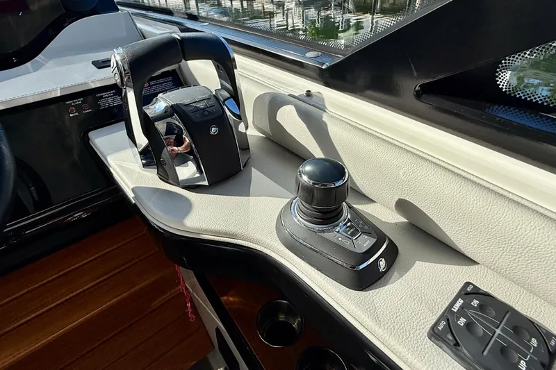  Yacht Photos Pics Control panel of 2022 Sea Ray Sundancer 370 Outboard, featuring joystick and throttle controls.