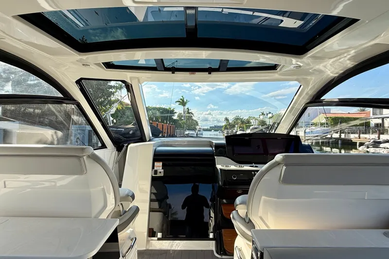  Yacht Photos Pics 2022 Sea Ray Sundancer 370 Outboard interior with panoramic windows and modern helm.