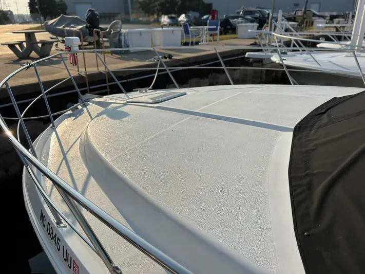 Musketeer Yacht Photos Pics 2000 Carver 406 Aft Cabin Motor Yacht docked, showcasing sleek deck design.