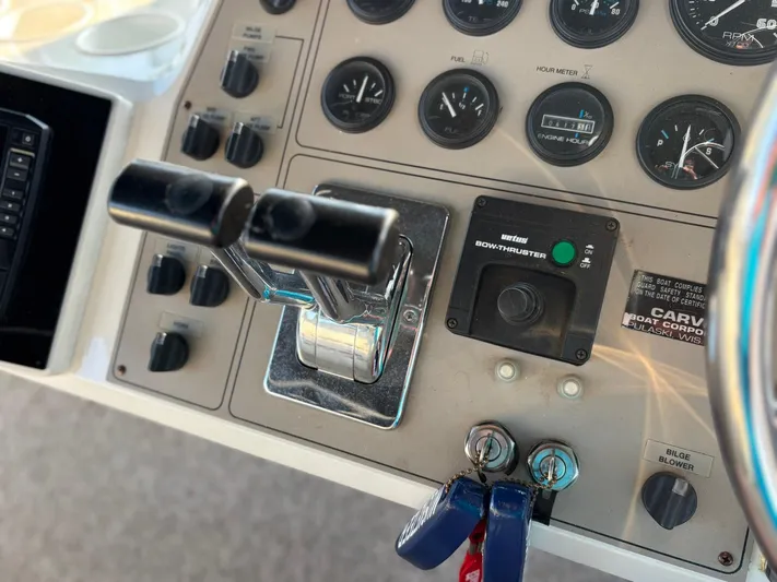 Musketeer Yacht Photos Pics Control panel of a 2000 Carver 406 Aft Cabin Motor Yacht with gauges and switches.