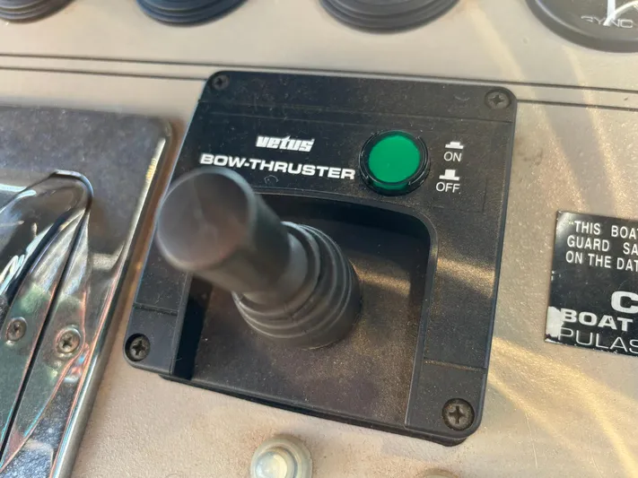 Musketeer Yacht Photos Pics Control panel of a 2000 Carver 406 Aft Cabin Motor Yacht with bow thruster switch.