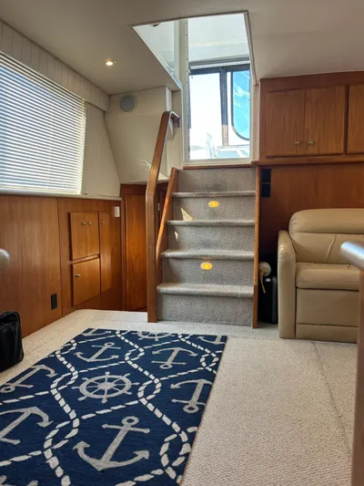 Musketeer Yacht Photos Pics Interior of 2000 Carver 406 Aft Cabin Motor Yacht with nautical-themed decor.