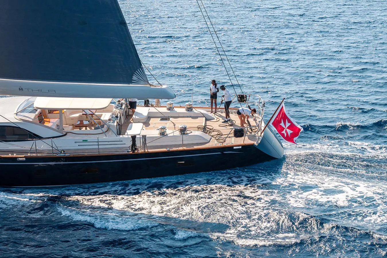 Luxurious 2009 Steve Ward & Co custom yacht sailing on open sea.