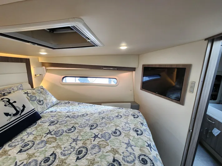 Foxyot Yacht Photos Pics Luxurious bedroom interior of 2022 Regal 38 Grande Coupe yacht.