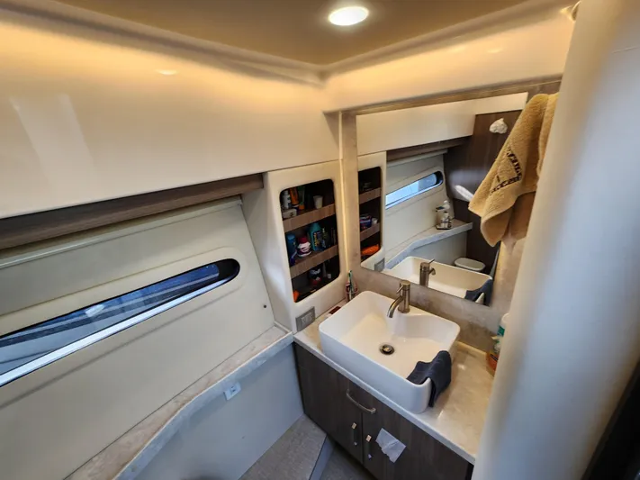 Foxyot Yacht Photos Pics Luxurious bathroom interior of 2022 Regal 38 Grande Coupe yacht.