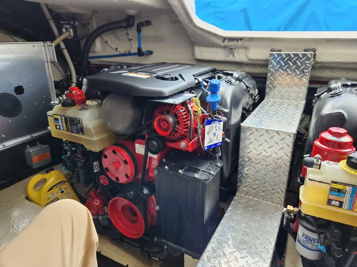 Foxyot Yacht Photos Pics Engine room of 2022 Regal 38 Grande Coupe with visible components and equipment.
