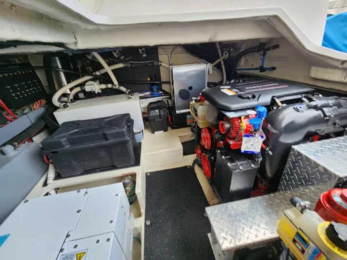 Foxyot Yacht Photos Pics Engine room of 2022 Regal 38 Grande Coupe with visible components and wiring.