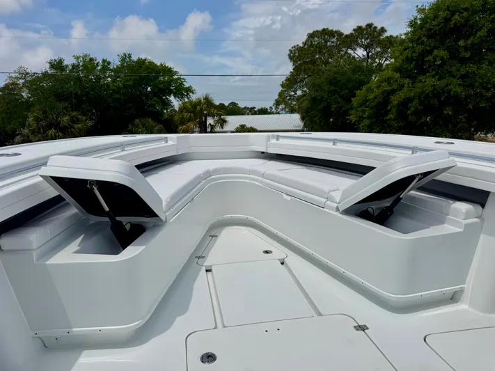  Yacht Photos Pics 2020 Yellowfin 39 Offshore boat with open storage compartments on deck.