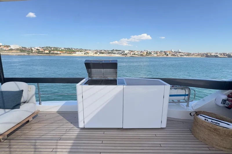  Yacht Photos Pics Luxury deck view on 2025 Azimut Grande 26M yacht with ocean backdrop.
