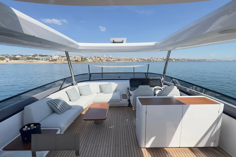  Yacht Photos Pics Luxurious 2025 Azimut Grande 26M yacht deck with elegant seating and ocean view.