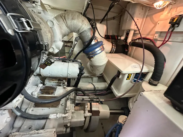 Vivacious Yacht Photos Pics Engine room of 2002 Grand Banks Eastbay 43, showcasing mechanical components and wiring.