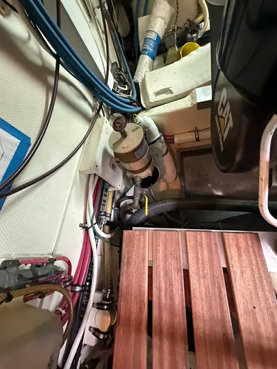 Vivacious Yacht Photos Pics Engine room of 2002 Grand Banks Eastbay 43 with visible CAT engine components.