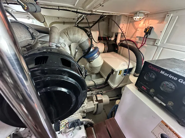Vivacious Yacht Photos Pics Engine room of 2002 Grand Banks Eastbay 43 with Onan Marine Generator.