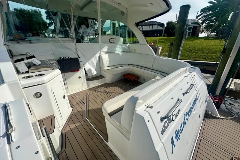  Yacht Photos Pics 2011 Cruisers Yachts 420 Sports Coupe interior with seating and deck view.