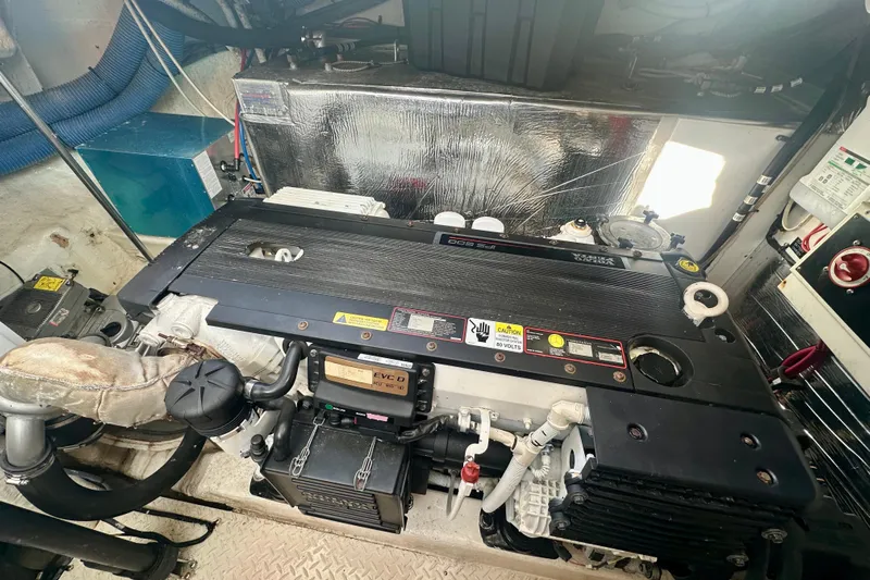  Yacht Photos Pics Engine room of a 2011 Cruisers Yachts 420 Sports Coupe, featuring a Volvo Penta engine.