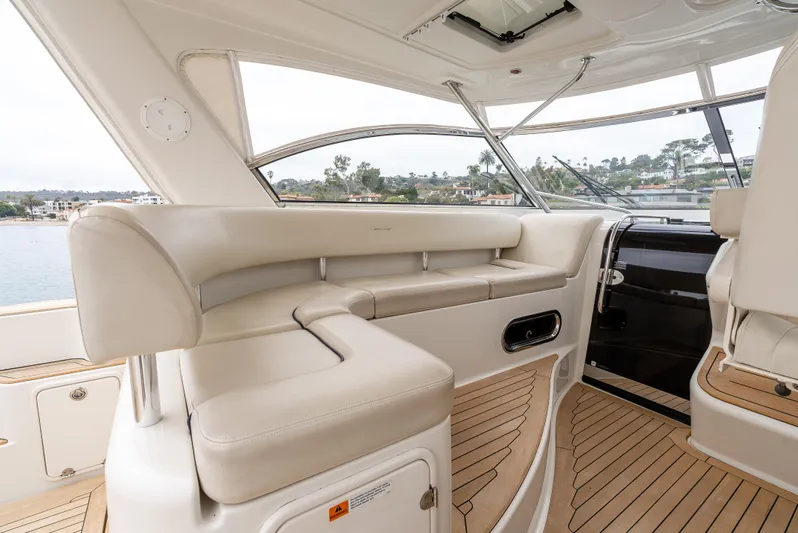 Zissou Yacht Photos Pics Luxurious interior of 2006 Chris-Craft Roamer 40 yacht with cream leather seating.