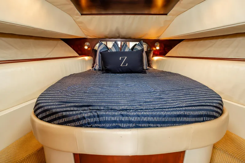 Zissou Yacht Photos Pics Luxurious cabin interior of 2006 Chris-Craft Roamer 40 yacht with elegant bedding.