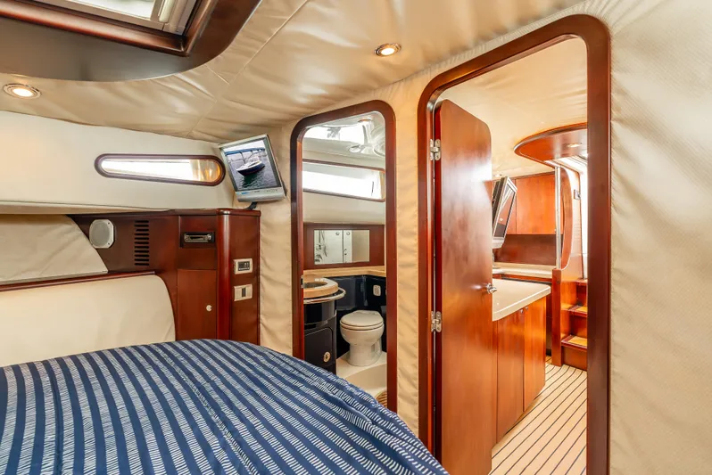 Zissou Yacht Photos Pics Luxurious interior of 2006 Chris-Craft Roamer 40 yacht with wood finishes and modern amenities.
