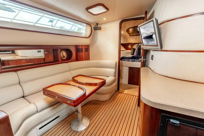 Zissou Yacht Photos Pics Luxurious interior of 2006 Chris-Craft Roamer 40 yacht with elegant seating and modern amenities.