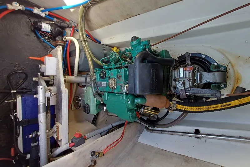  Yacht Photos Pics Engine compartment of 2007 Fountaine Pajot Mahe 36 catamaran, showcasing mechanical components.