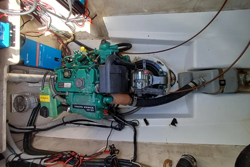  Yacht Photos Pics Engine compartment of 2007 Fountaine Pajot Mahe 36 with Volvo Penta engine.