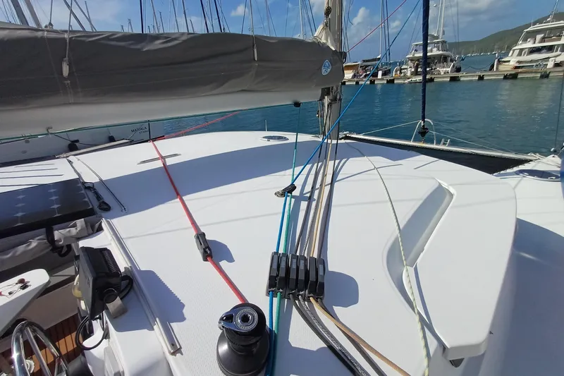  Yacht Photos Pics 2007 Fountaine Pajot Mahe 36 catamaran deck with rigging and marina view.