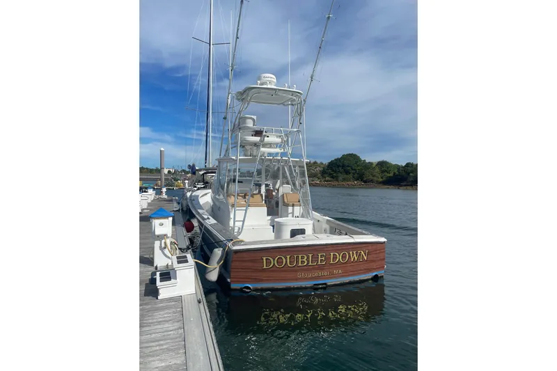 "double Down" Yacht Photos Pics 2014 Release Walkaround boat "Double Down" docked in Gloucester, MA, under clear skies.
