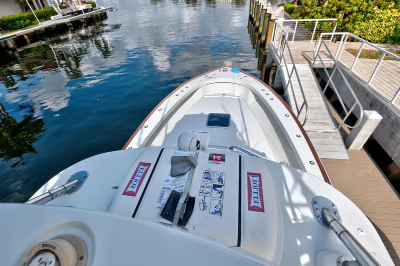 "double Down" Yacht Photos Pics 2014 Release Walkaround boat docked by a serene waterfront.