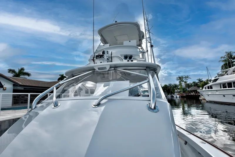 "double Down" Yacht Photos Pics 2014 Release Walkaround boat docked, featuring sleek design and clear blue sky backdrop.