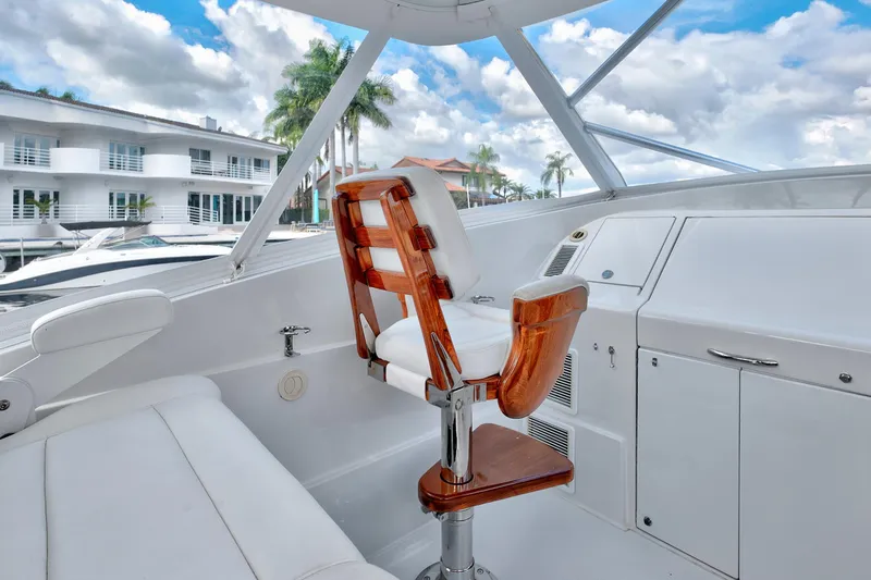 "double Down" Yacht Photos Pics Luxurious 2014 Release Walkaround boat interior with white seating and wooden accents.