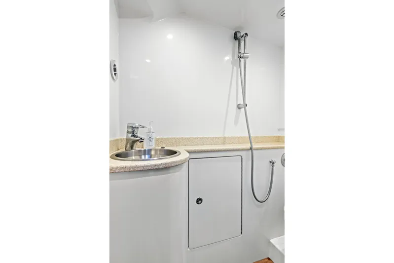 "double Down" Yacht Photos Pics Modern boat bathroom with sink, shower, and storage in 2014 Release Walkaround model.