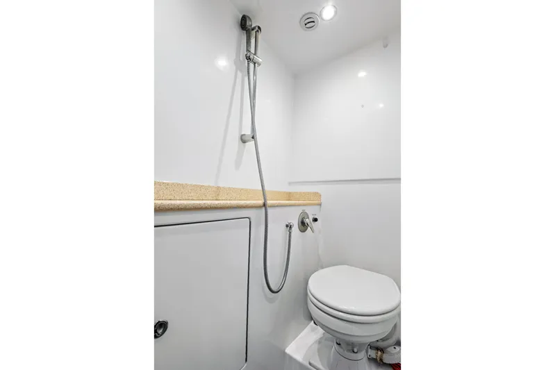 "double Down" Yacht Photos Pics Compact bathroom in 2014 Release Walkaround boat with shower and toilet.