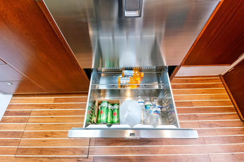 "double Down" Yacht Photos Pics Stainless steel drawer fridge with drinks on a wooden yacht floor, 2014 Release Walkaround.