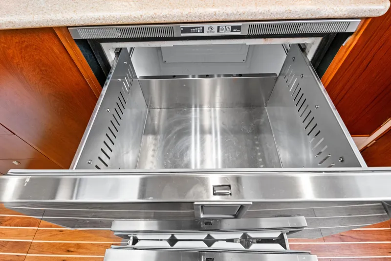 "double Down" Yacht Photos Pics Open stainless steel drawer in a 2014 Release Walkaround kitchen.