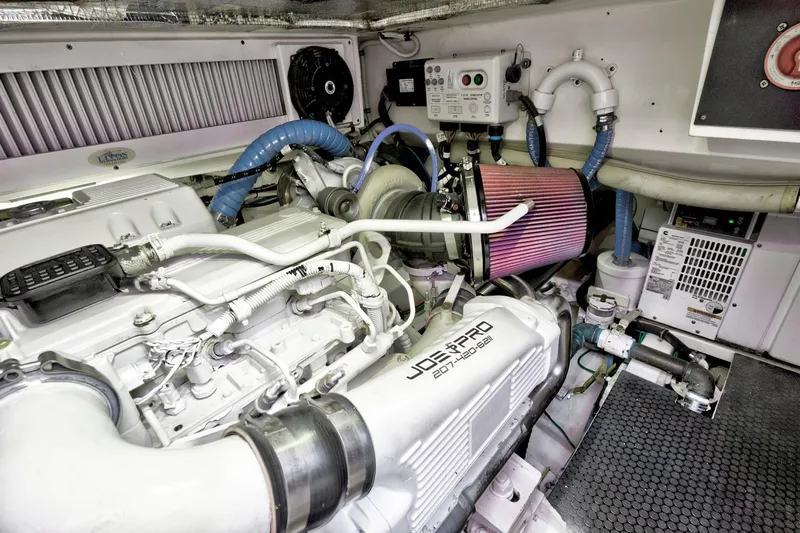 "double Down" Yacht Photos Pics Engine room of a 2014 Release Walkaround boat, featuring a powerful marine engine.