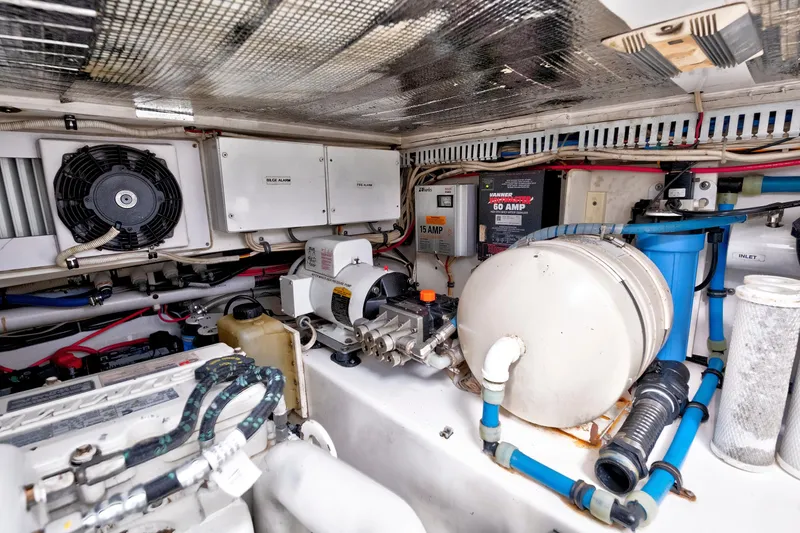 "double Down" Yacht Photos Pics Engine room of a 2014 Release Walkaround boat with various mechanical components.