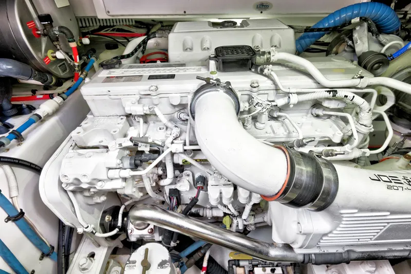 "double Down" Yacht Photos Pics Engine compartment of a 2014 Release Walkaround boat, showcasing detailed mechanical components.
