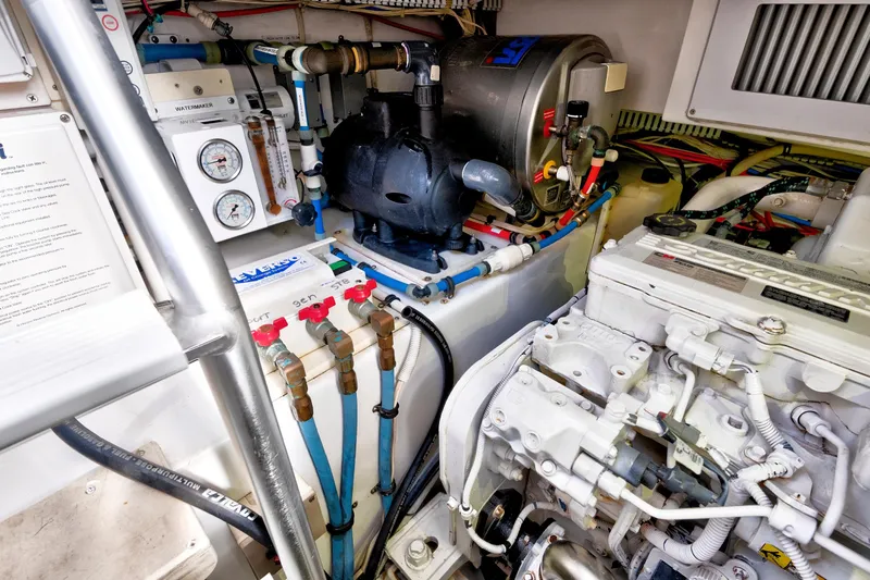 "double Down" Yacht Photos Pics Engine room of a 2014 Release Walkaround boat, featuring mechanical components and gauges.