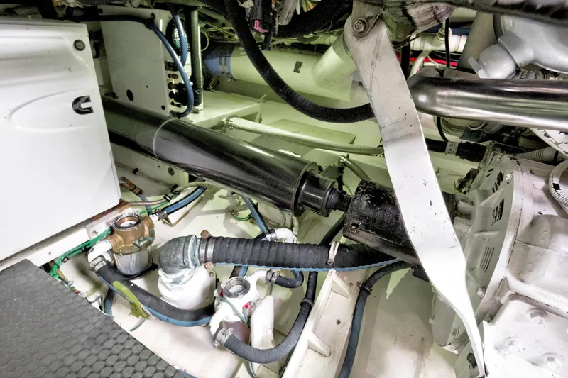 "double Down" Yacht Photos Pics Engine room of a 2014 Release Walkaround boat, showcasing mechanical components and piping.