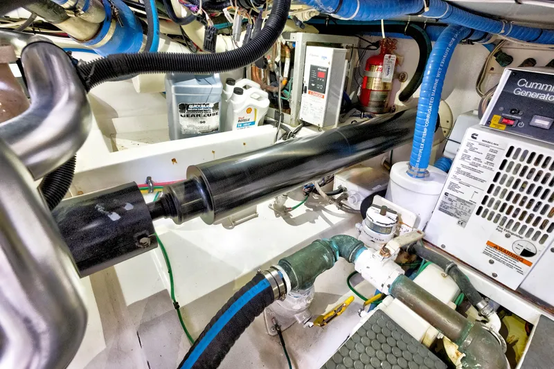 "double Down" Yacht Photos Pics Engine room of a 2014 Release Walkaround boat with Cummins generator and various components.