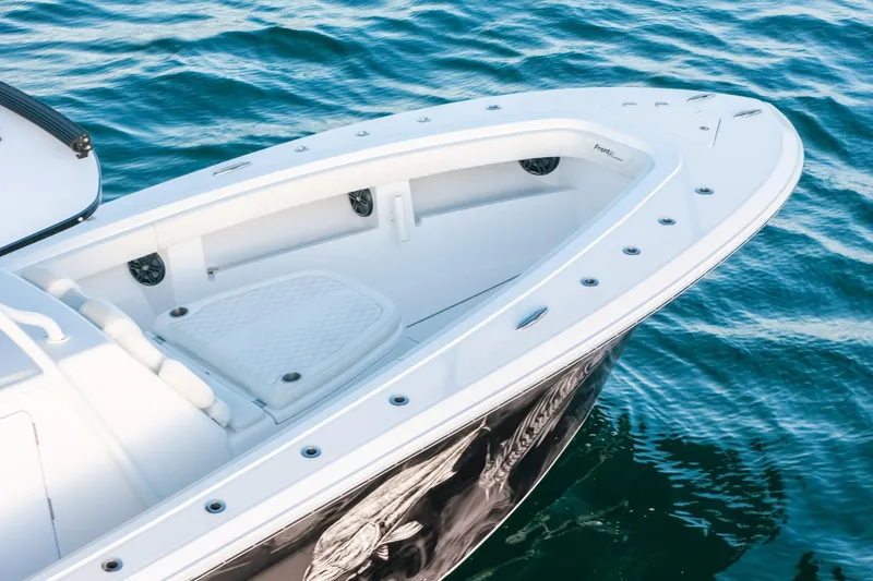  Yacht Photos Pics 2023 Front Runner 36 Center Console boat on water, showcasing sleek design and spacious deck.