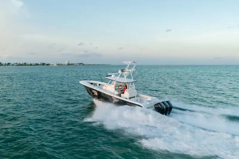  Yacht Photos Pics 2023 Front Runner 36 Center Console boat cruising on open water.