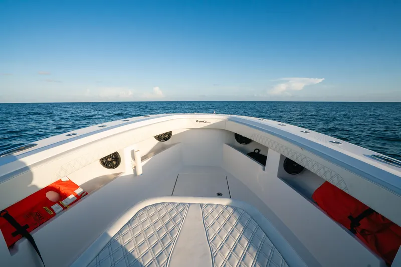  Yacht Photos Pics 2023 Front Runner 36 Center Console boat on open sea under clear blue sky.