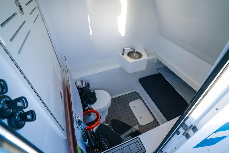  Yacht Photos Pics 2023 Front Runner 36 Center Console interior with sink and toilet.